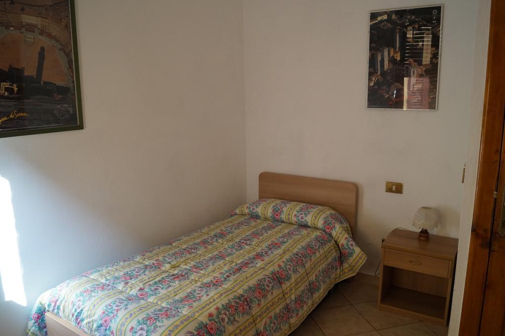 Hotel Il Pozzo Della Citerna à Castelnuovo Berardenga Chambre photo