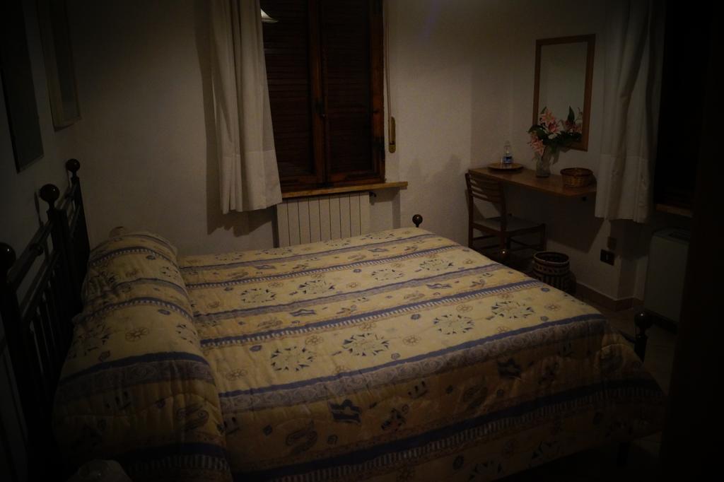 Hotel Il Pozzo Della Citerna à Castelnuovo Berardenga Chambre photo